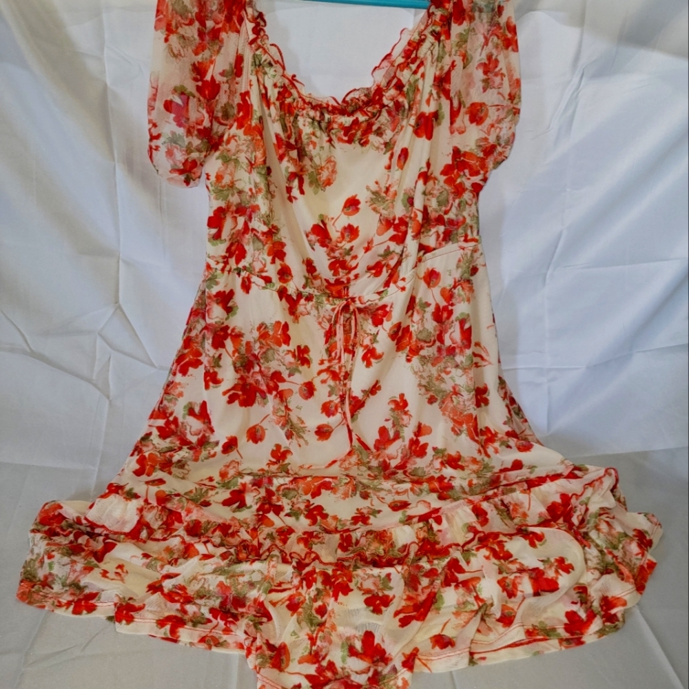 BEAUTIFUL sundress.   Cream in color with flowers.  Flowy, soft and lightweight